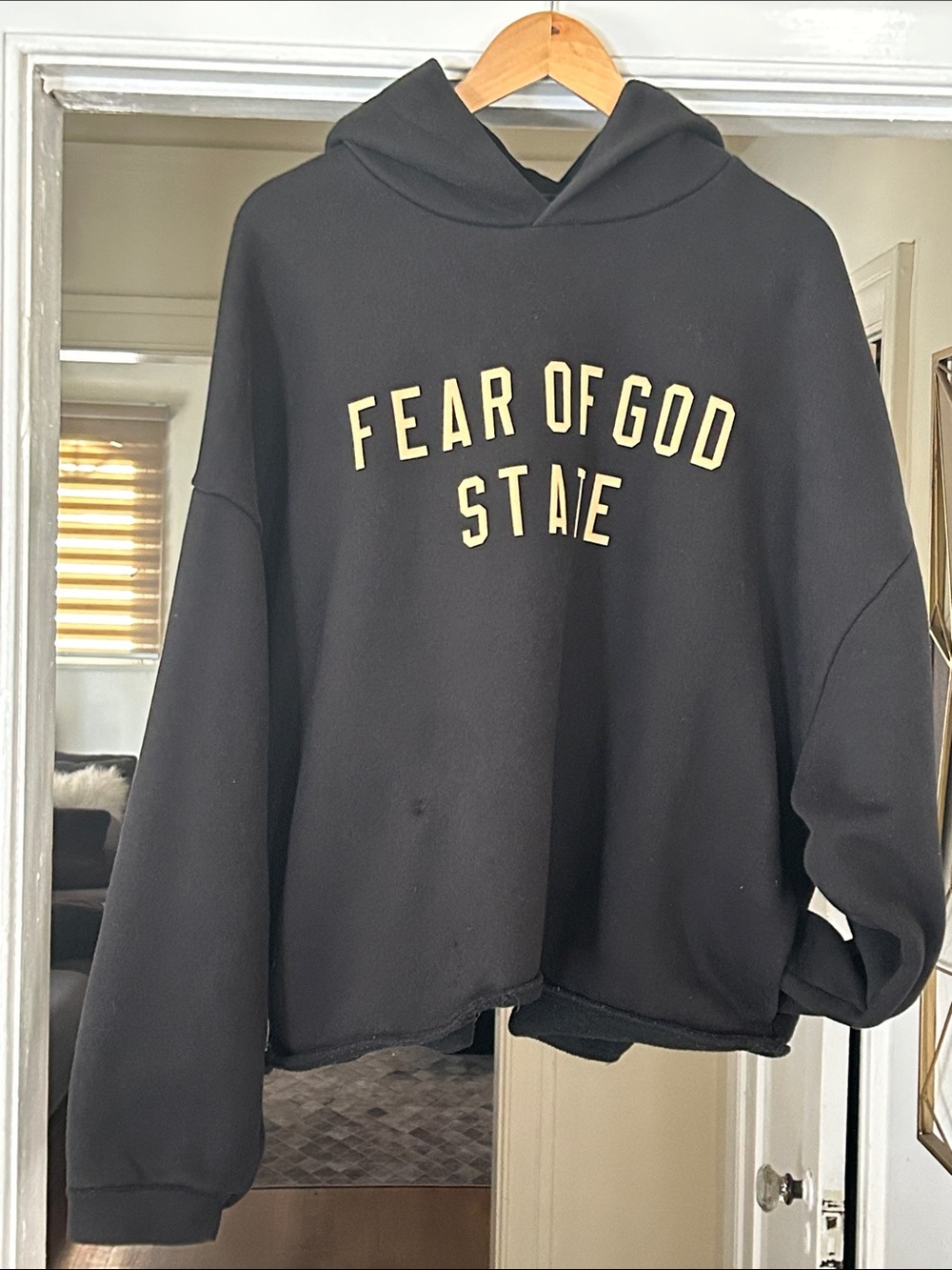 Fear of God Black Hoodie with Cream Lettering